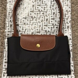 Longchamp Elegant Black Tote with Brown Trim